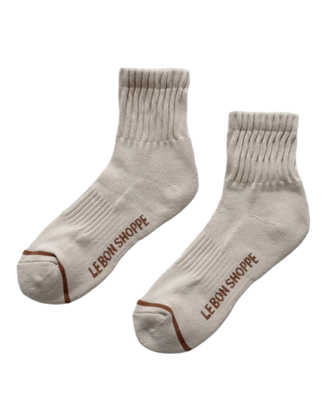 Pair of beige socks with 'Le Bon Shoppe' branding