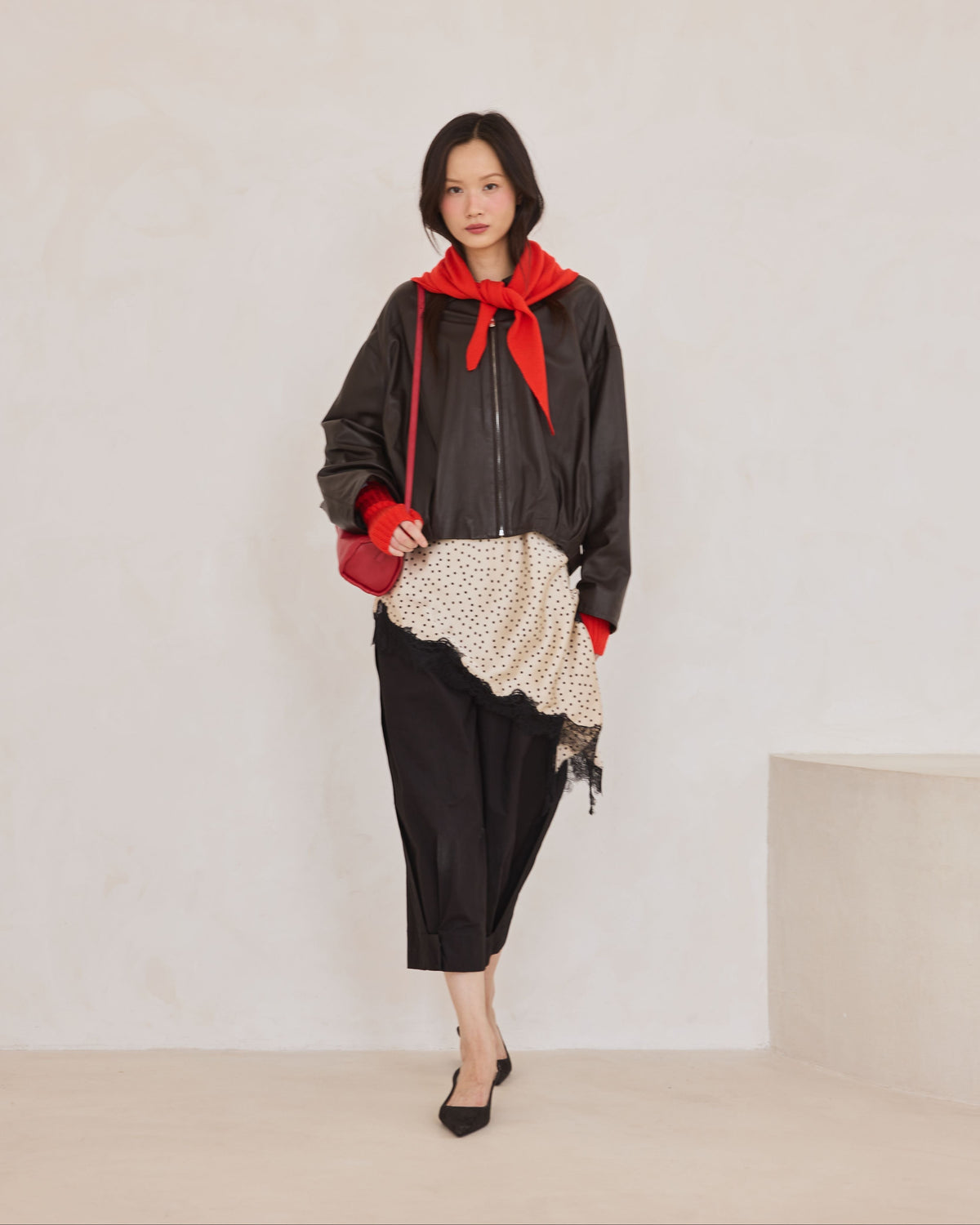 Arctic Fox & Co. Merino Wool Triangle Scarf (S) Lava Red - model wearing the scarf