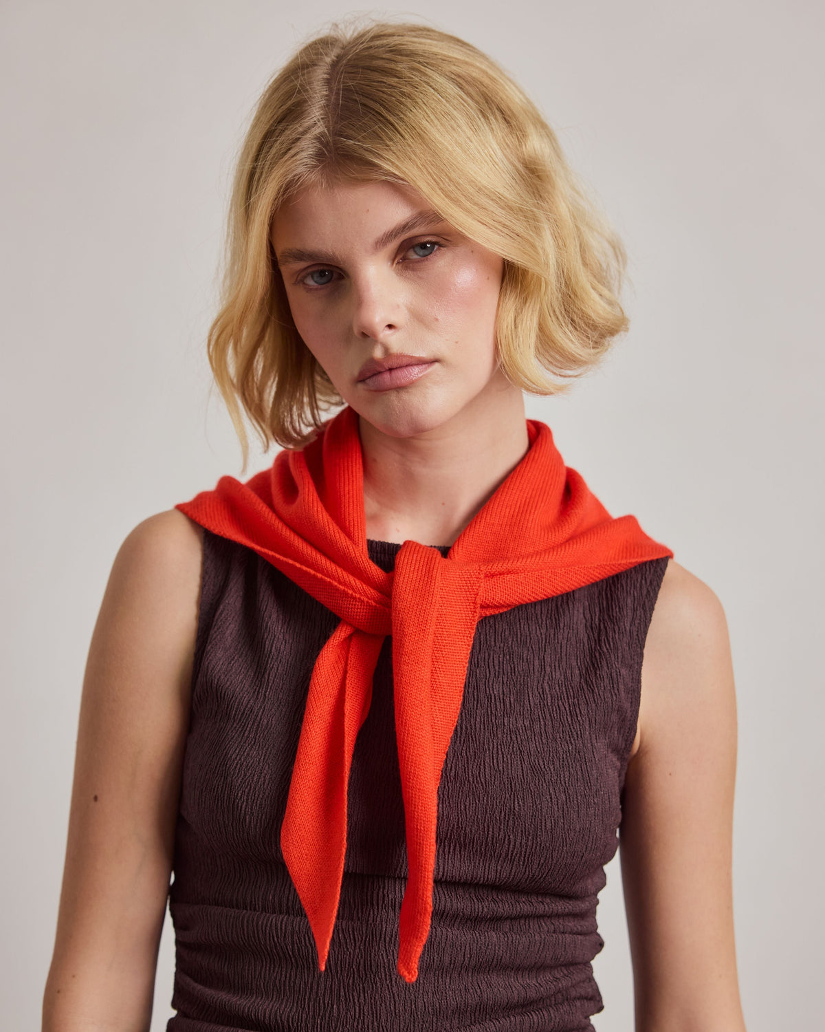 Arctic Fox & Co. Merino Wool Triangle Scarf (S) Lava Red - model wearing the scarf