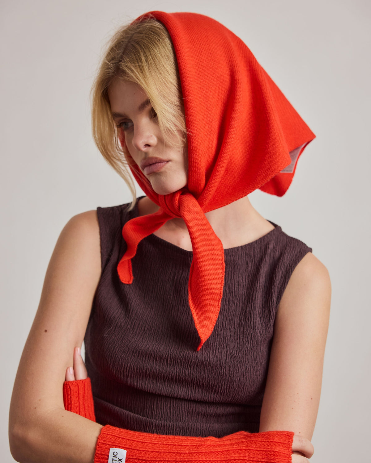 Arctic Fox & Co. Merino Wool Triangle Scarf (S) Lava Red - model wearing the scarf