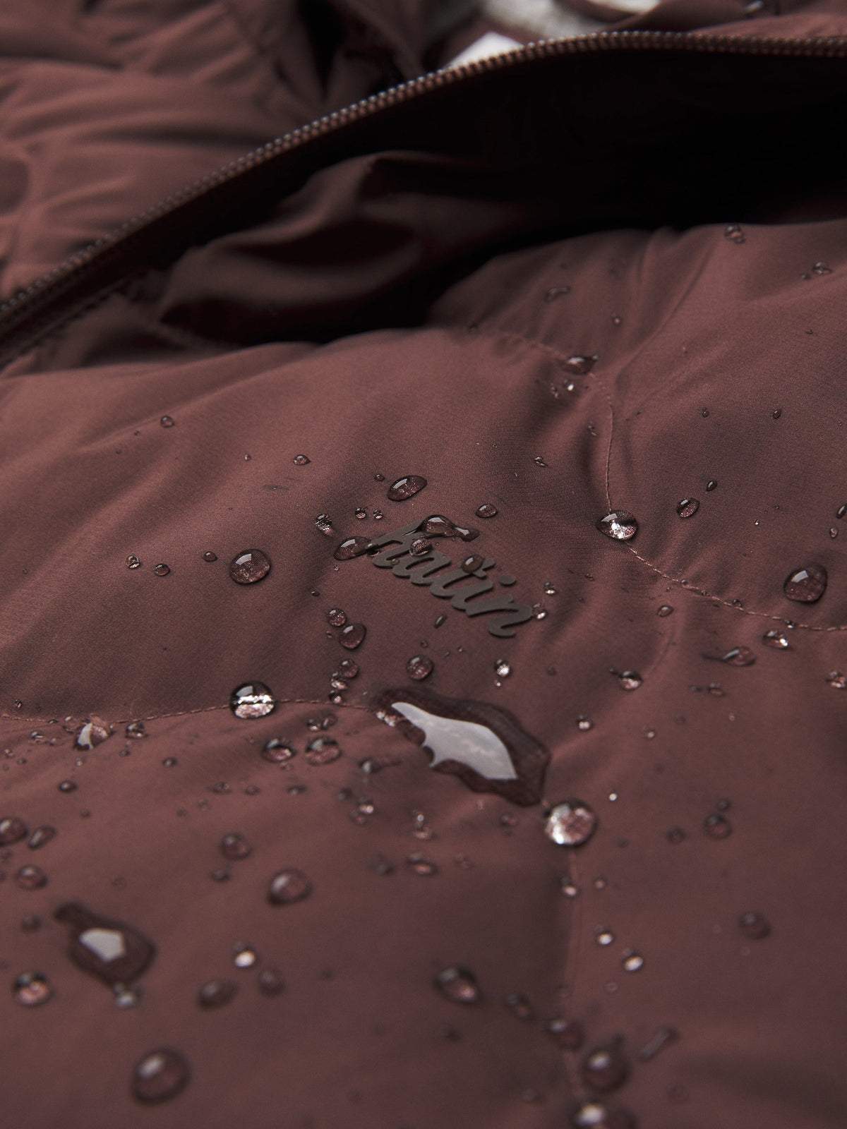 Katin OTG Henson Hooded Puffer in French Roast, flat, logo and water proof detail